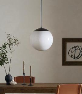 sphere pendant lamp above dining table